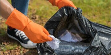 Councillor Zwane helps clean the streets of Atteridgeville