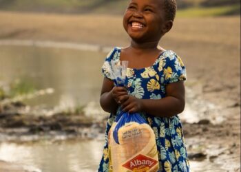 The photographer behind the Albany Bread Girl Photo