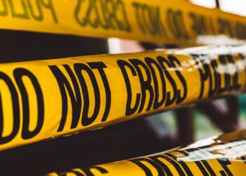 do not cross police barricade tape close-up photography